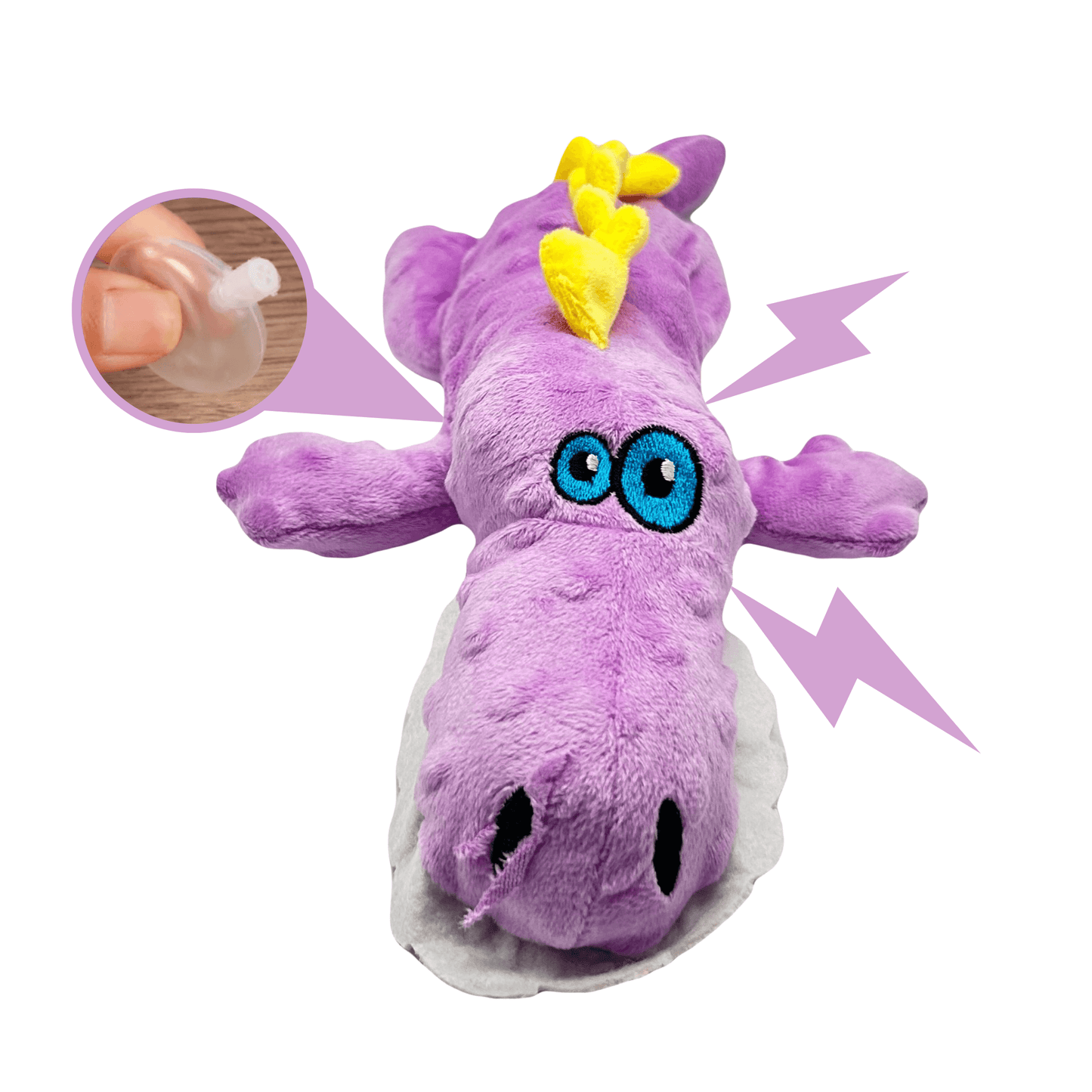 Paarse pluche dino met gele rugkam en blauwe ogen, voorzien van een pieper. Bliksemschichten duiden op geluidseffect.